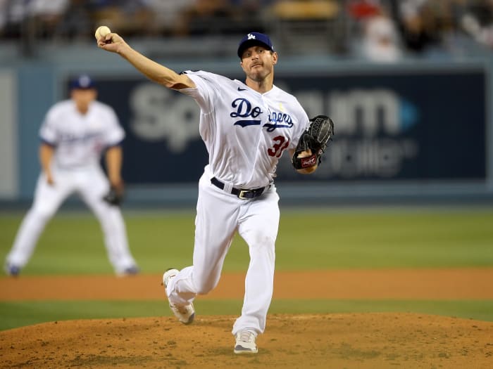 Sep 1, 2021; Los Angeles, California, USA; Los Angeles Dodgers starting pitcher Max Scherzer (31) pitches in the third inning of the game against the Atlanta Braves at Dodger Stadium.